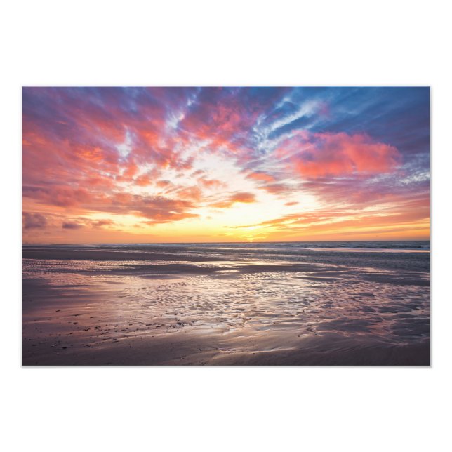 Foto Atardecer sobre la playa y el mar (Frente)