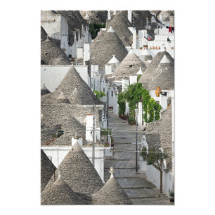 Foto Calle con las casas del trulli en Alberobello,