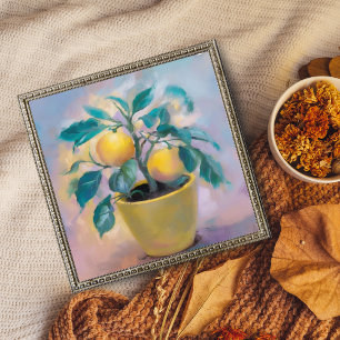 Foto Citrus soleado: Árbol de limón en una olla amarill