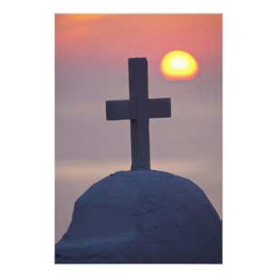 Foto Cruz en lo alto de la iglesia al atardecer, Mykono
