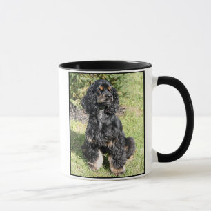Foto de cocker spaniel en la taza de cerámica