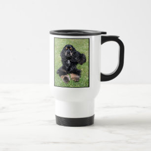 Foto de cocker spaniel en la taza del viaje
