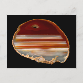 Foto de la rebanada de Agate pulida en postal negr