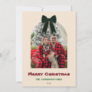 Foto de Navidad de la familia con lazo elegante