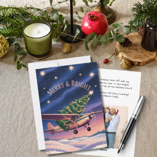 Foto divertida de avión vintage y árbol de Navidad