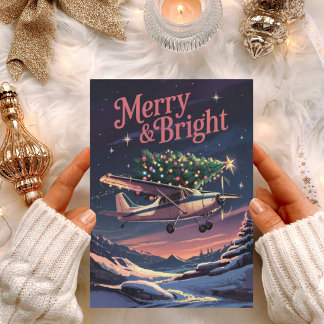 Foto divertida de avión vintage y árbol de Navidad