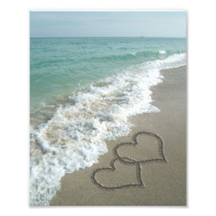 Foto Dos corazones de arena en la playa, océano románti