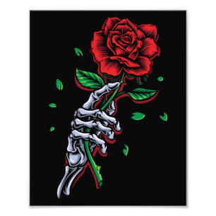 Foto Flor rosa roja de la mano del esqueleto
