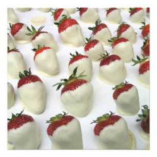 Foto Fresas sumergidas en el chocolate blanco