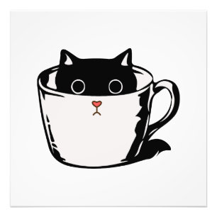 Foto Gatito negro con nariz roja escondido en una taza