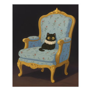 Foto Gato negro en sillón floral azul