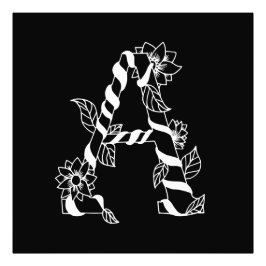 Foto Letra negra y blanca "A" con flores de remolque