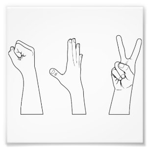 Foto Manos de papel de las tijeras de la roca