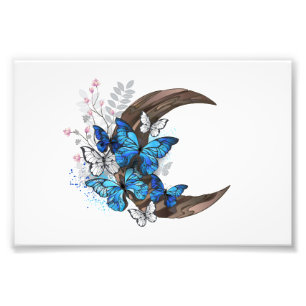 Foto Mariposas azules sobre la media luna de madera