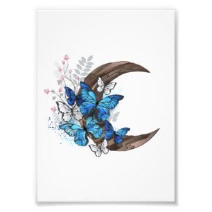 Foto Mariposas azules sobre la media luna de madera