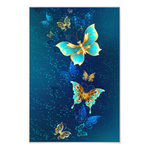 Foto Mariposas doradas sobre fondo azul