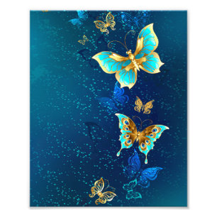 Foto Mariposas doradas sobre fondo azul