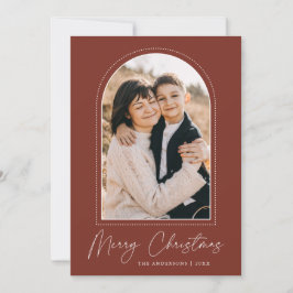 Foto marrón de arco nevado Feliz Navidad