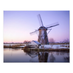 Foto Molino de viento durante salida del sol en Holanda
