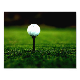 Foto Pelota de golf en camiseta con la impresión verde