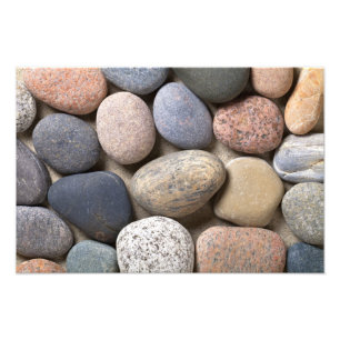 Foto Piedras del guijarro en la arena para el fondo