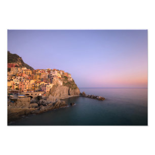 Foto Puesta del sol sobre el pueblo de Manarola en