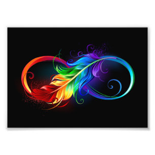 Foto Símbolo infinito con plumas arcoiris