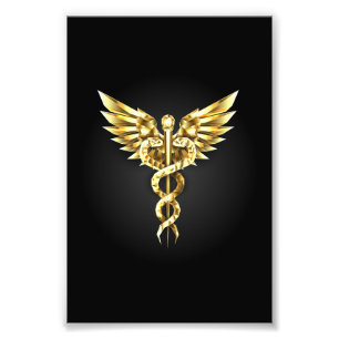 Foto Símbolo poligonal de oro Caduceus