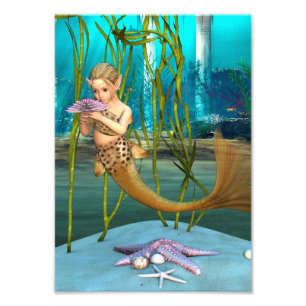 Foto Sirena pequeña con flor de anémona