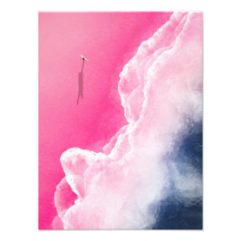 Foto Un surfista en una playa rosada en Indonesia