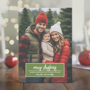 Foto vertical de Feliz Navidad con ramas caprichos
