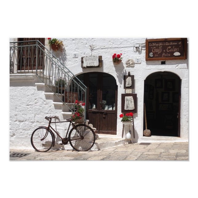 Foto Vieja bicicleta y escaparate en Apulia (Frente)