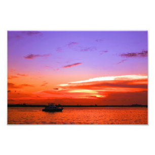 Foto yate y puesta del sol