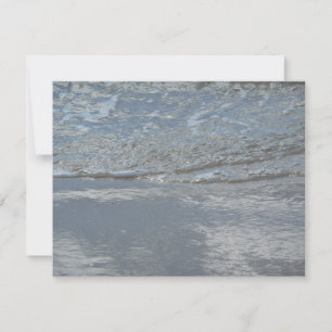 Fotografía abstracta de agua lamiendo la playa
