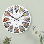 Fotos en forma de corazón Reloj grande redondo bla<br><div class="desc">Crea tu propio reloj multifoto. La plantilla de la foto se configura para que añada 12 fotos que se muestran en un marco con forma de corazón. El diseño utiliza fotos verticales retratadas para todos los números excepto 3 y 9 que están en formato horizontal horizontal horizontal. La paleta de...</div>