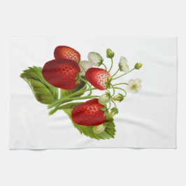 Fresas con toalla de cocina de hojas verdes