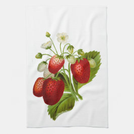 Fresas con toalla de cocina de hojas verdes