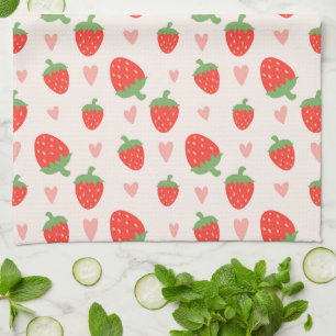 Fresas dulces y toalla de cocina para el corazón
