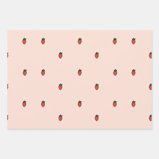 Fresas pequeñas ricas en papel de envoltura rosa (Anverso)