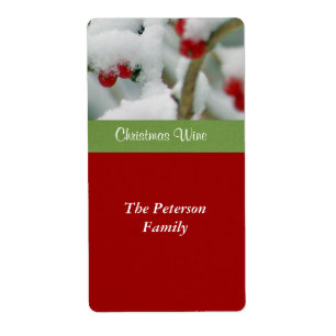 Fresas rojas con etiqueta de vino festivo en la ni