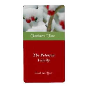 Fresas rojas con etiqueta de vino festivo en la ni