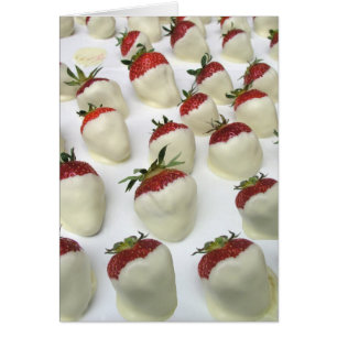 Fresas sumergidas en el chocolate blanco