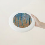 Frisbee De Wham-O Gustav Klimt Beech Tree Forest Grove<br><div class="desc">Se basa en obras de arte clásicas de pintura natural de Gustav Klimt, Beech Grove 1, 1902. La obra representa un denso bosque de abedules altos y delgados, con troncos pálidos marcados por líneas oscuras y verticales. El follaje está pintado en tonos azules, verdes y amarillos, lo que añade una...</div>