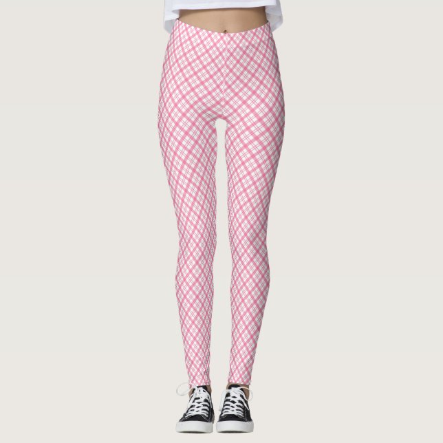 Front and back views of pink plaid leggings worn  (Anverso)