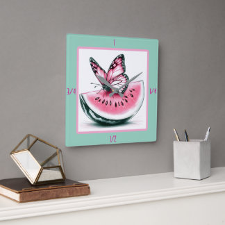 Fruta divertida y reloj de pared de mariposa
