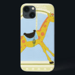 Funda Para iPhone 13 Carrusel Giraffe por June Erica Vess<br><div class="desc">Si no puedes dirigirte al parque y hacer un recorrido de diversión, entonces esta impresión puede ser la mejor alternativa. June Erica Vess hizo esta impresionante interpretación de una jirafa carrusel sobre un fondo azul pastel y verde. Solo quieres dar un paseo en círculos. ¡Pon este viaje de diversión en...</div>