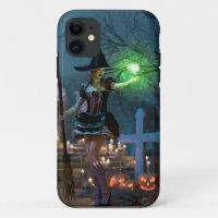 Chica de brujas de Halloween en el bosque