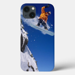 title_seo2 Hombre en un snowboard saltando de un cornice en