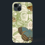 Funda Para iPhone 13 Mariposas en la música de hojas con diseño floral<br><div class="desc">Un diseño floral verde y una partitura de papel sirven como telón de fondo de un trío de mariposas en esta pieza de Vision Studio. La palabra francesa para mariposa, papillon, también está estampada al final de la pieza. Si te gustan mucho las mariposas, la naturaleza, o como si te...</div>