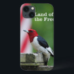 Funda Para iPhone 13 Pancomys rojus<br><div class="desc">Pájaro carpintero de cabeza roja en un alimentador de pájaros de patio trasero con bandera estadounidense. Foto enviada por un lector de Birds & Blooms. Birds & Blooms es la revista de pájaros y jardines número 1 en Norteamérica. Nos enorgullecemos de celebrar la "belleza en su propio patio trasero" cubriendo...</div>